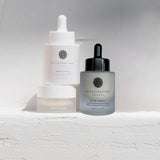 Wildcrafted Organics skincare products on a light gray background